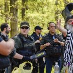 Communist Agitators Condemn ‘Protection’ of Amren Conference Vermin Supreme and Size 12 Boot